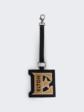 X Elton John E Charm